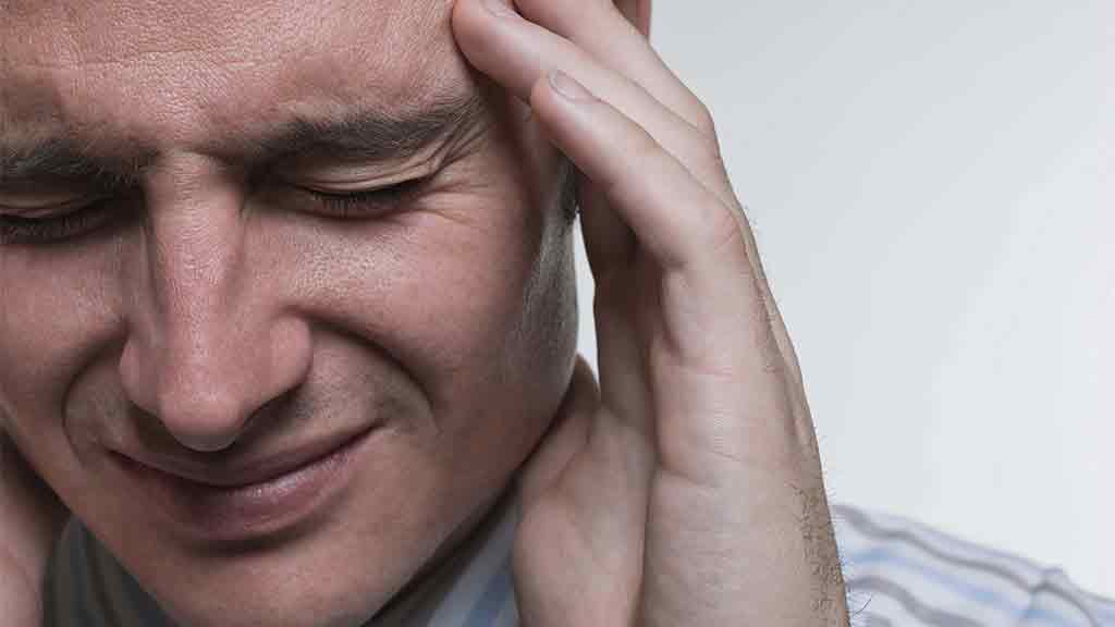 man with headache