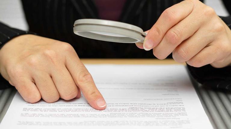 woman-reading-fine-print