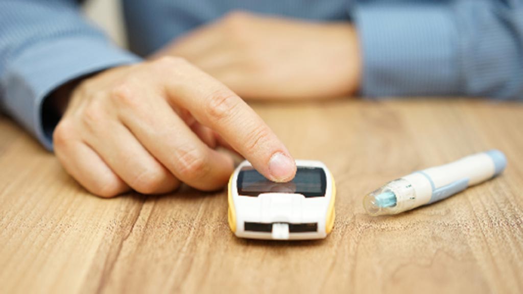 person with finger on blood glucose meter