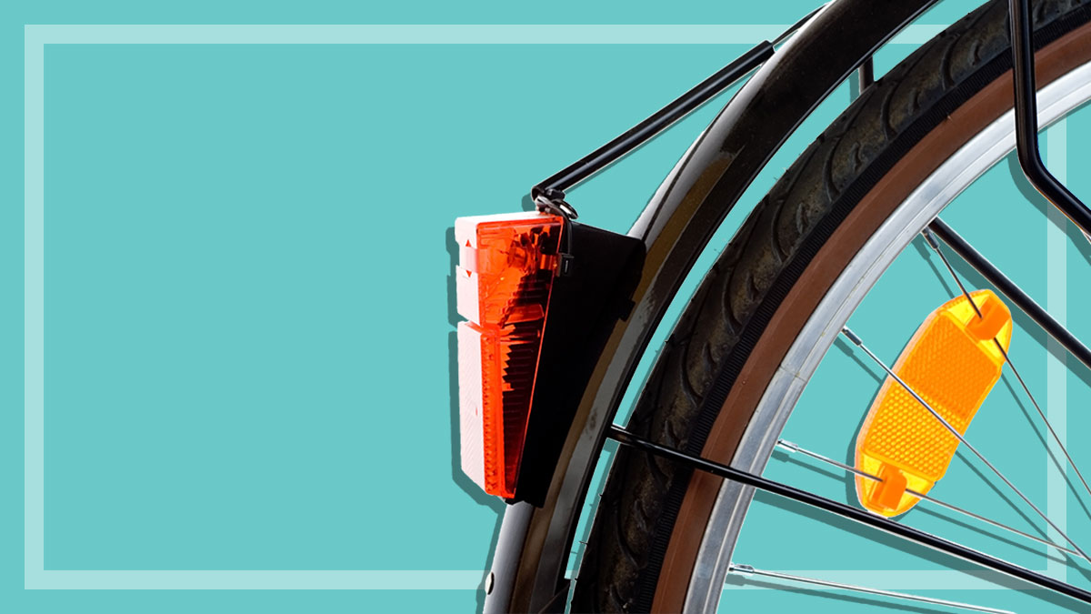 rear wheel of bicycle showing rear bike light