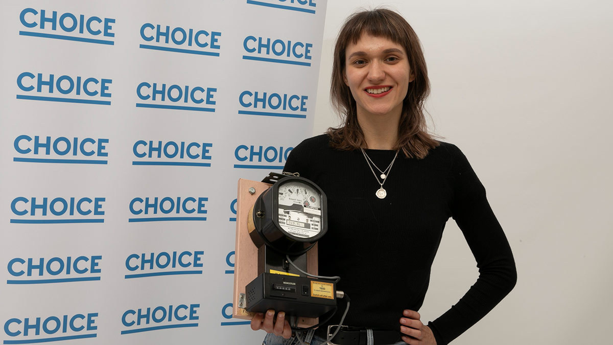 linda_from_choice_campaigns_holding_an_home_electricity_meter