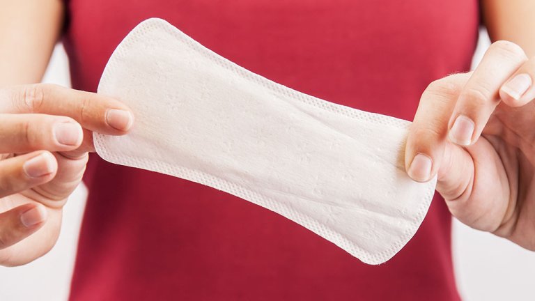 woman holding sanitary pad HWT