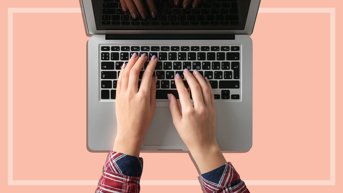 person setting up direct debits on laptop