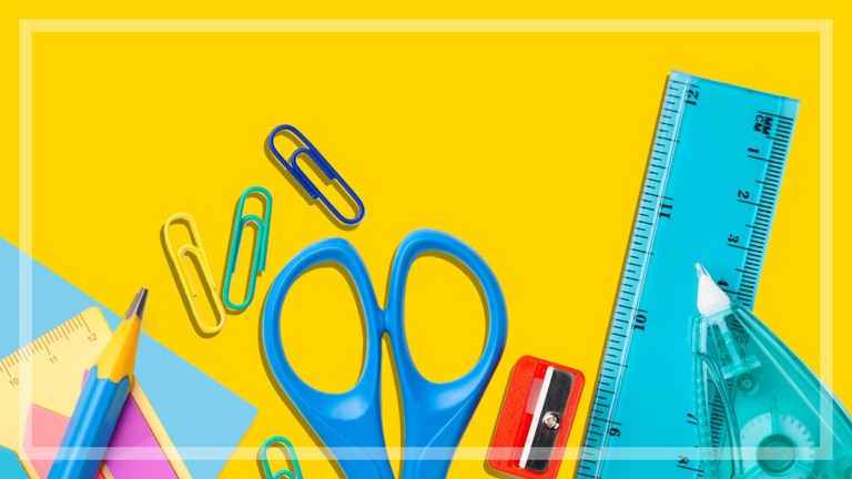 back to school supplies on yellow