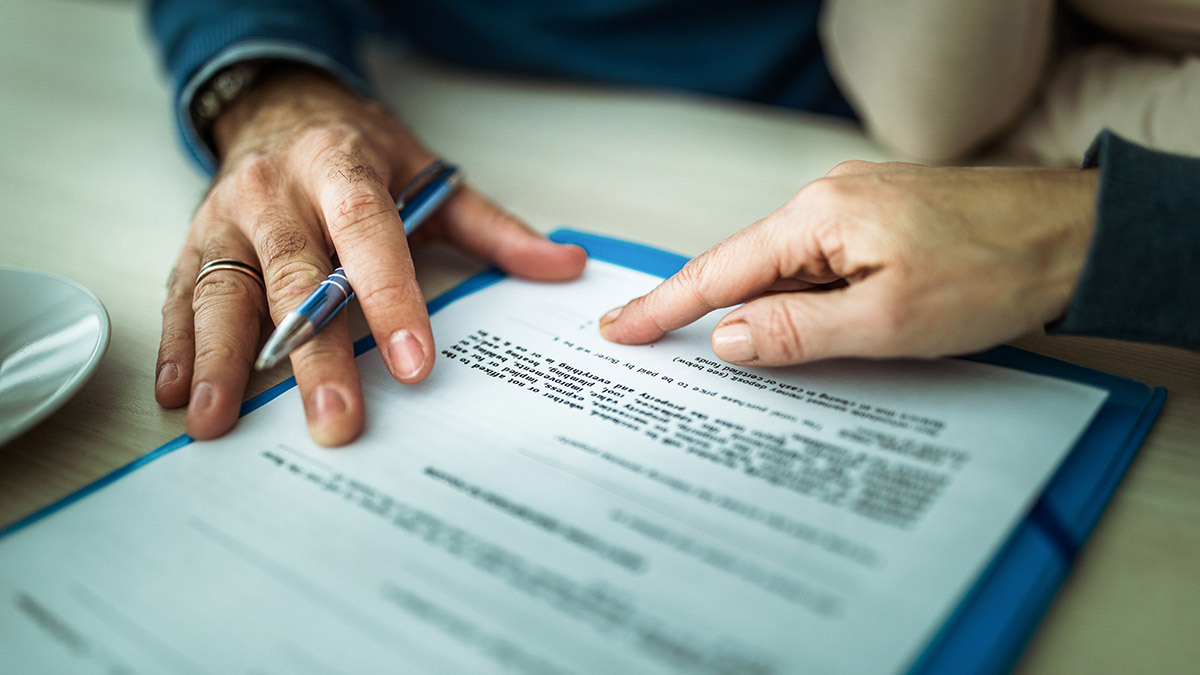people_looking_over_a_contract
