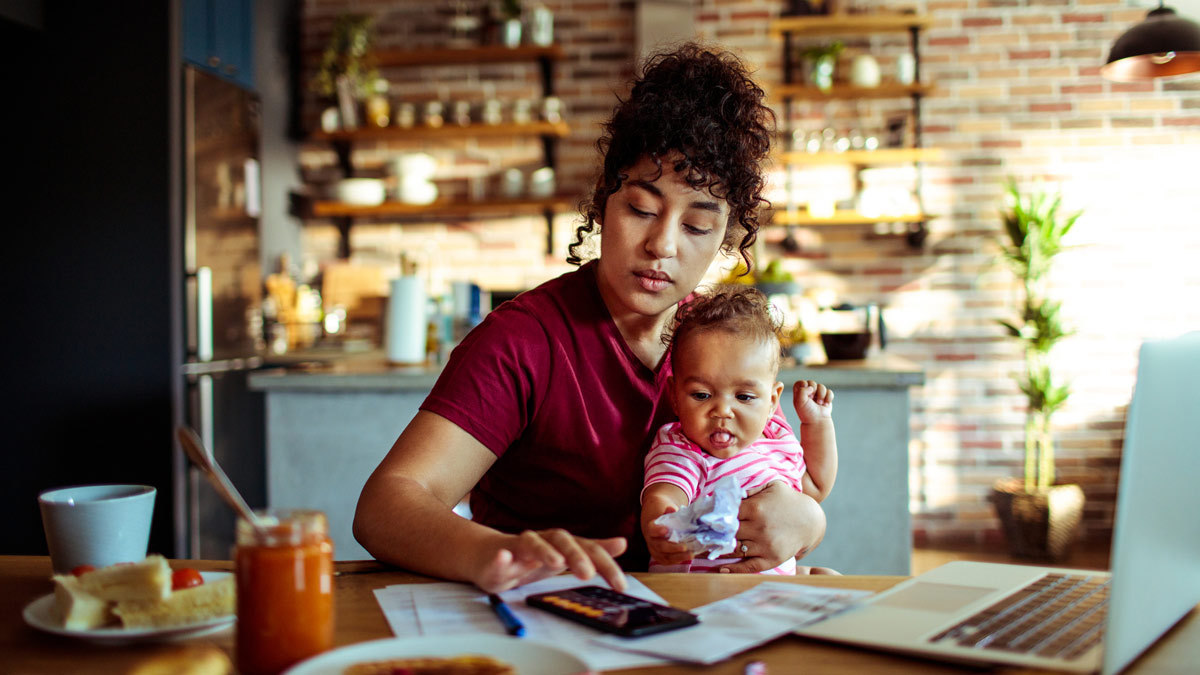 young_single_mother_working_out_finances_lead