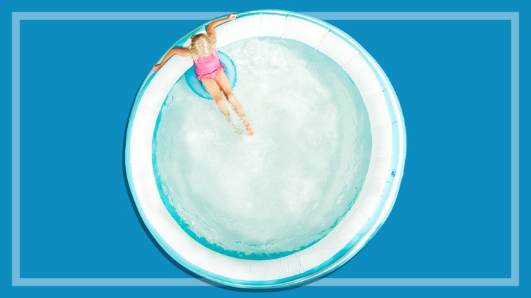 child sitting in an inflatable pool