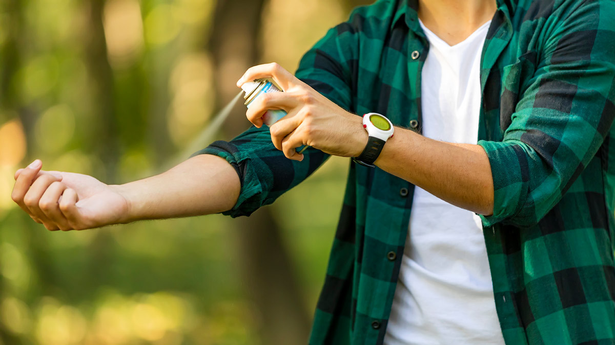 spraying_insect_spray_outside