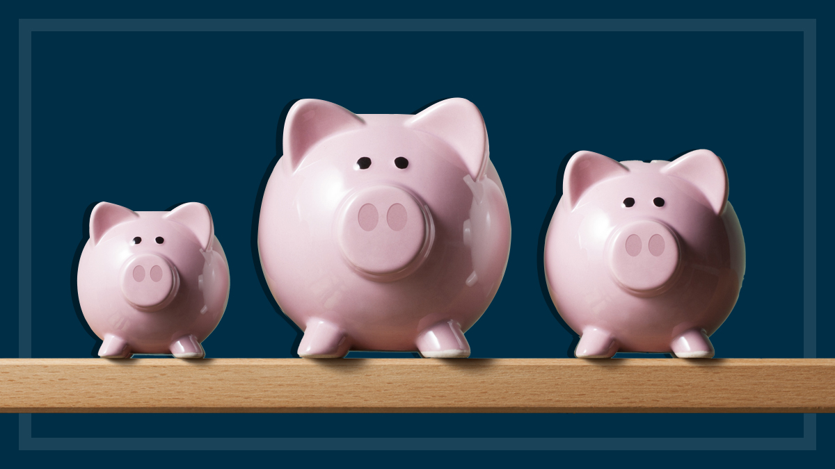 different_size_piggy_banks_on_navy_blue