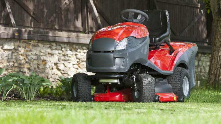 ride on mower in garden