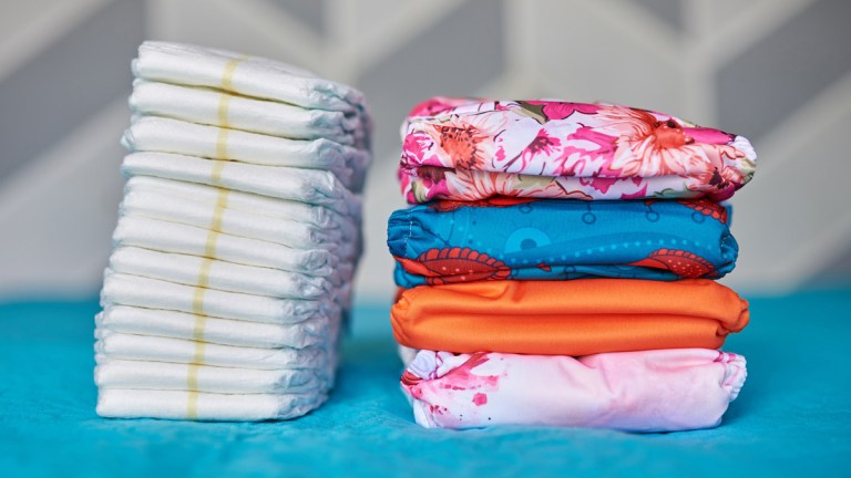 pile of disposable and reusable nappies