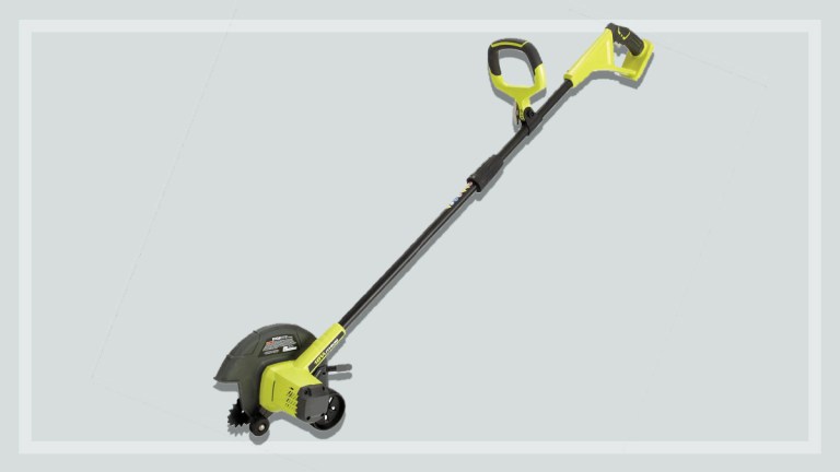 lime green lawn edger on a grey background