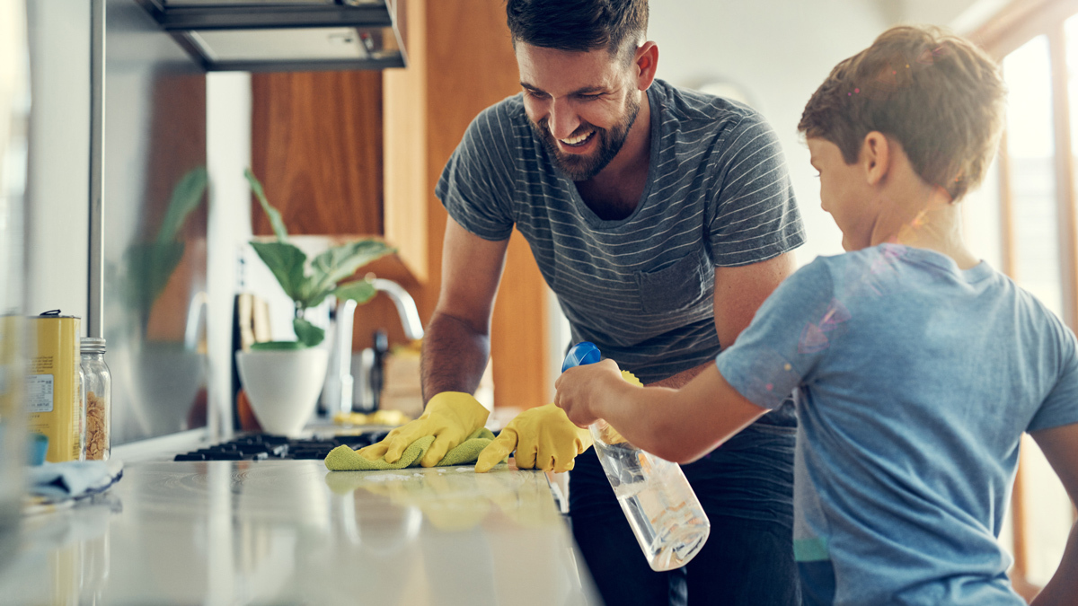 father and son spring cleaning