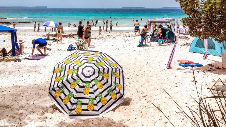 beach shelters ona beach in jervis bay australia