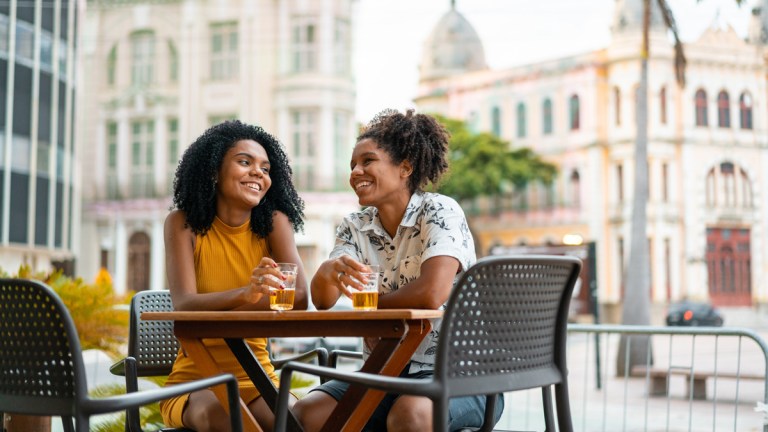 two people drinking while on holiday