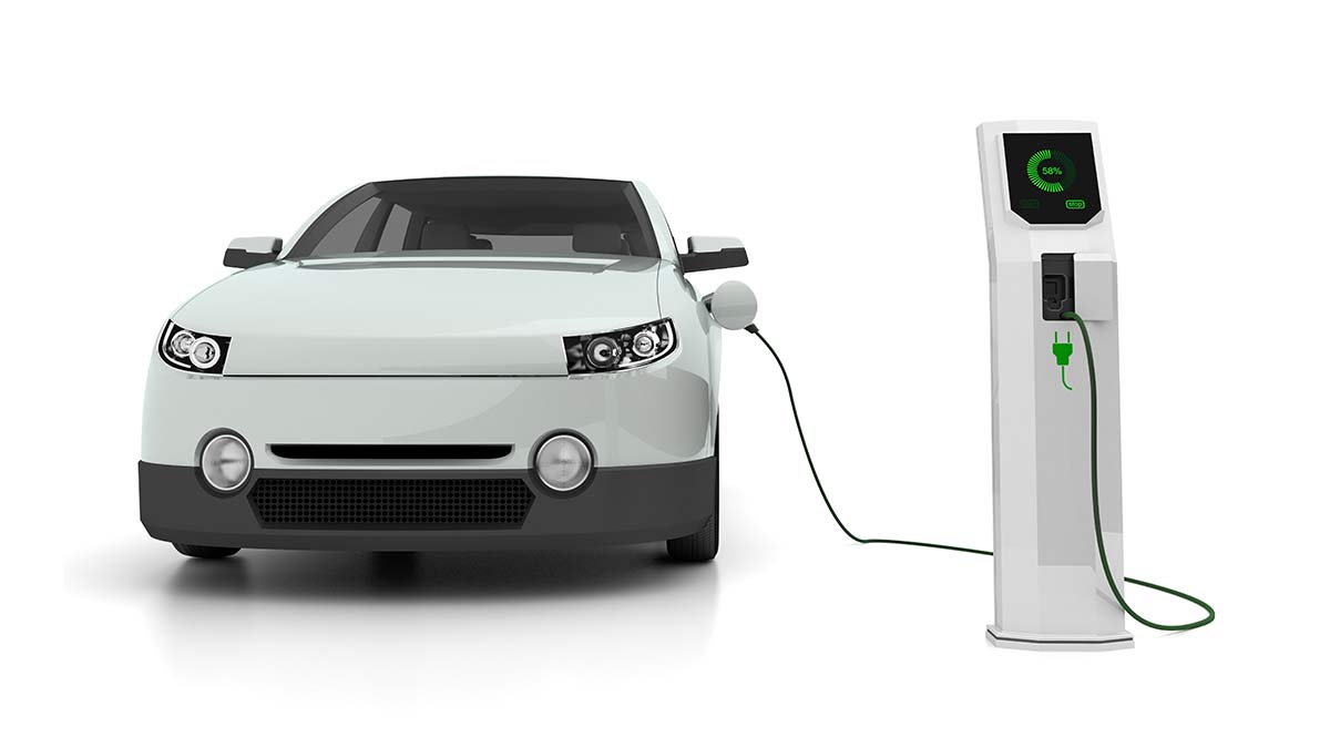 electric vehicle plugged into charging station