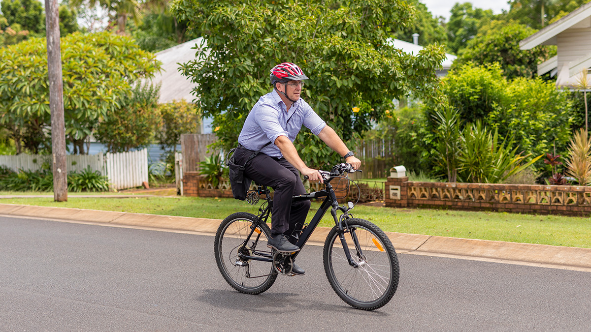 business person riding a bike to work